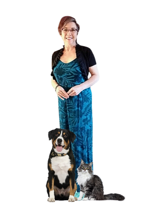 Arlana standing with a dog and cat at her feet